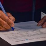 52 familias recibieron y firmaron escrituras de terrenos